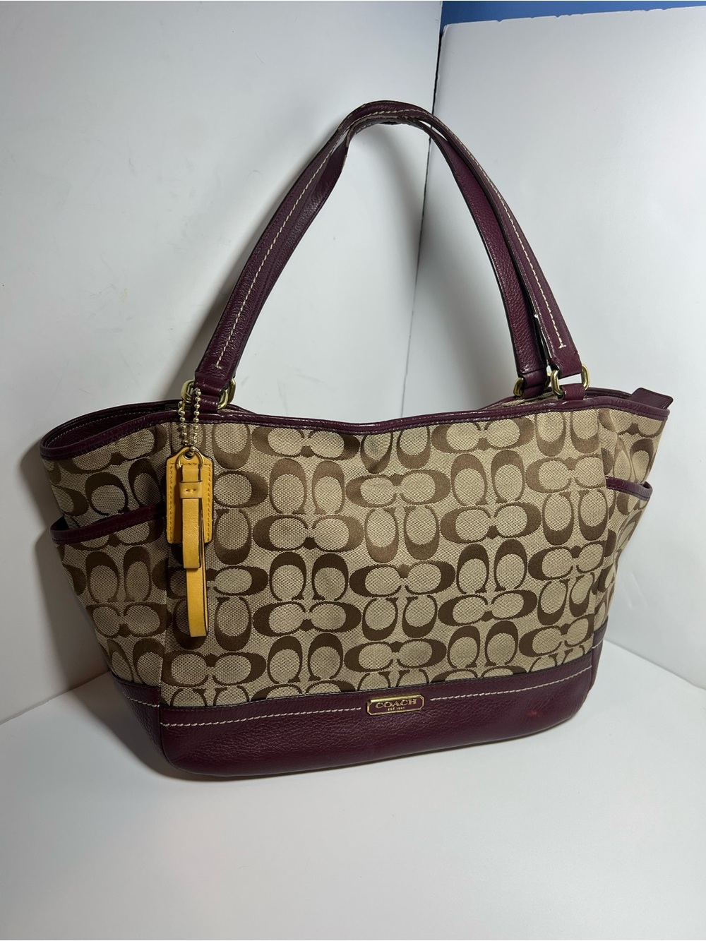 Coach Park Carrie Signature Canvas Tote with Burgundy Trim with minor defects